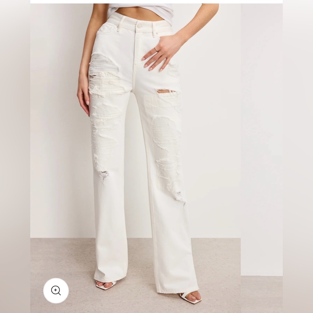 Good American Cream Distressed Flare Jeans